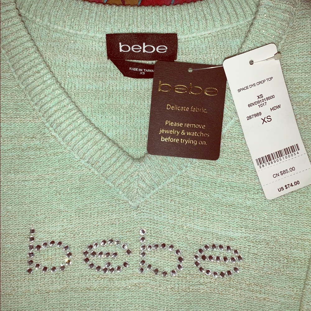 “SOLD”5/$25NWT Bebe Sweater!